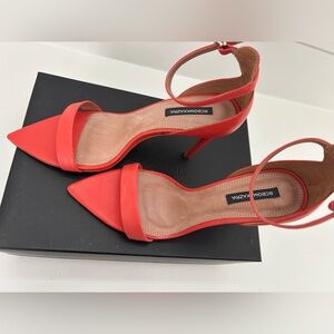 NIB BCBGMaxAzria women’s leather stilettos with pointed toes.